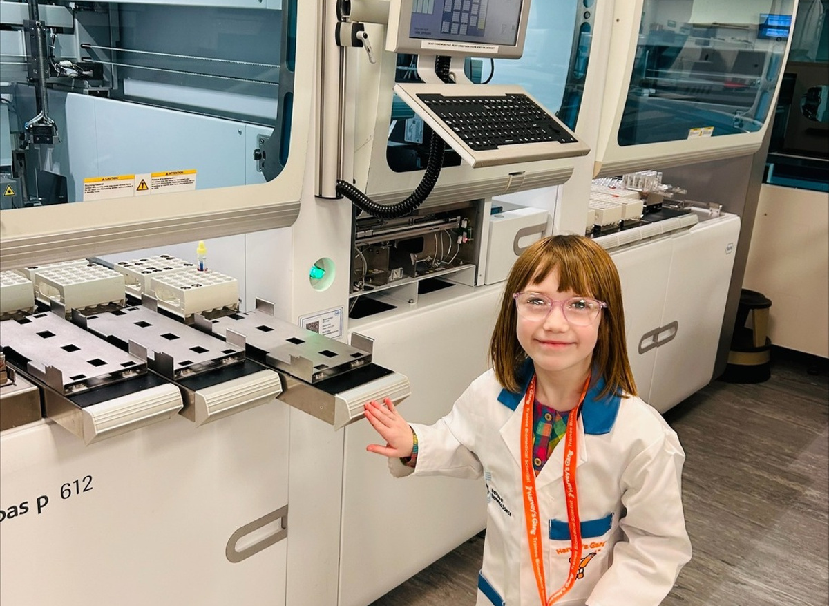 Beatrice exploring the lab during her tour