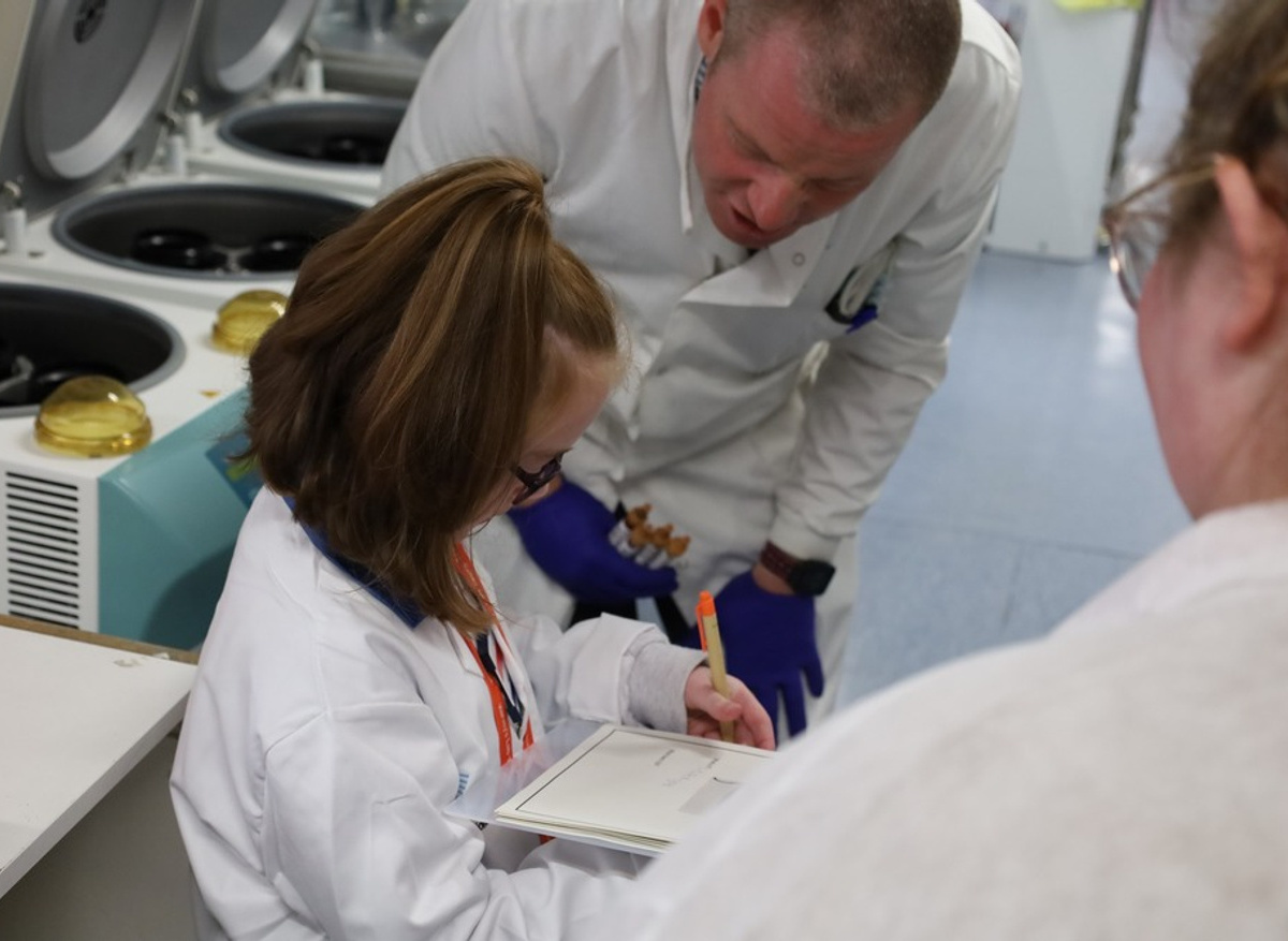 Peyton takes notes like a Junior Trainee Biomedical Scientist.