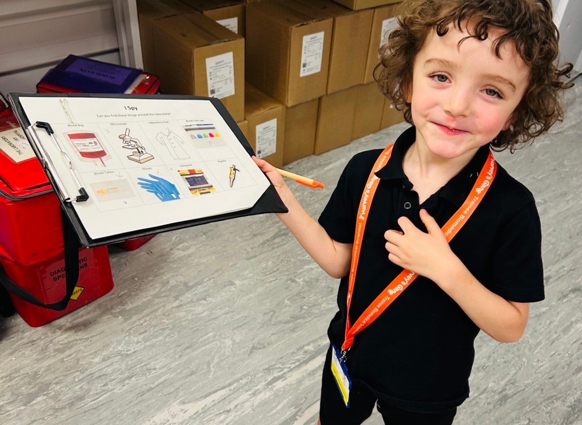 Completing his lab 'I Spy' checklist