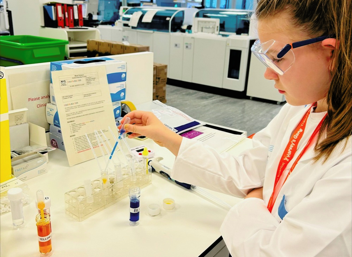 Trying out pipetting in the lab