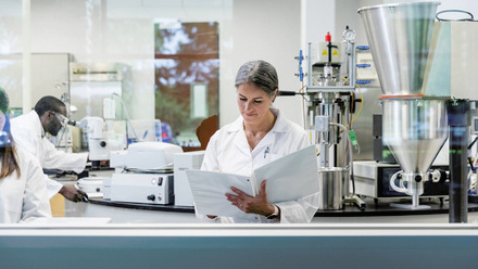 web-p34-37-eqa-lab-researcher-reading-binder-credit-istock-1646508449.jpg