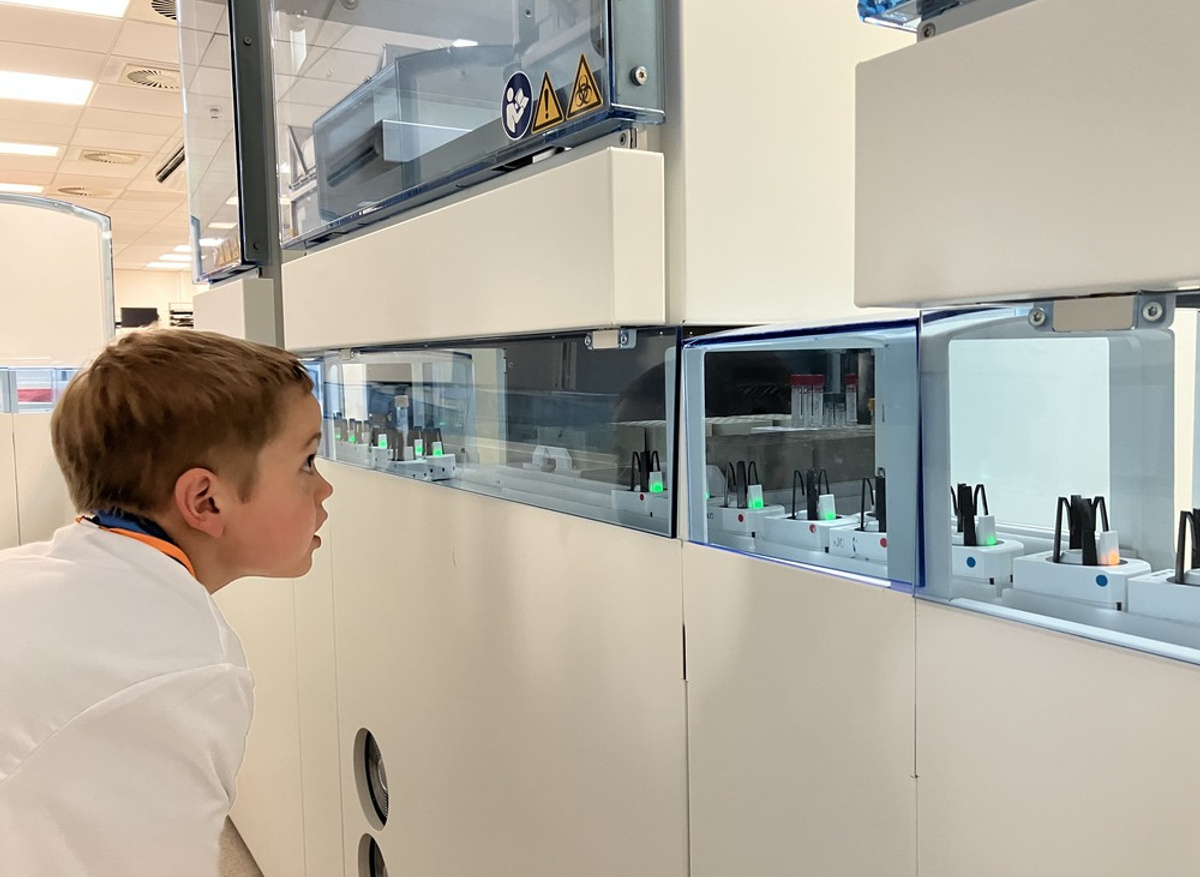 Josh watching the biochemistry sample track at work